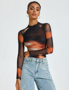 Black sheer mesh long-sleeve bodysuit with crew neck, double-lined, rust print