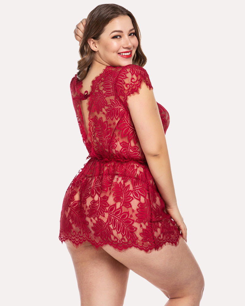 Plus size model in red eyelash lace babydoll lingerie with open back, perfect for a romantic night.