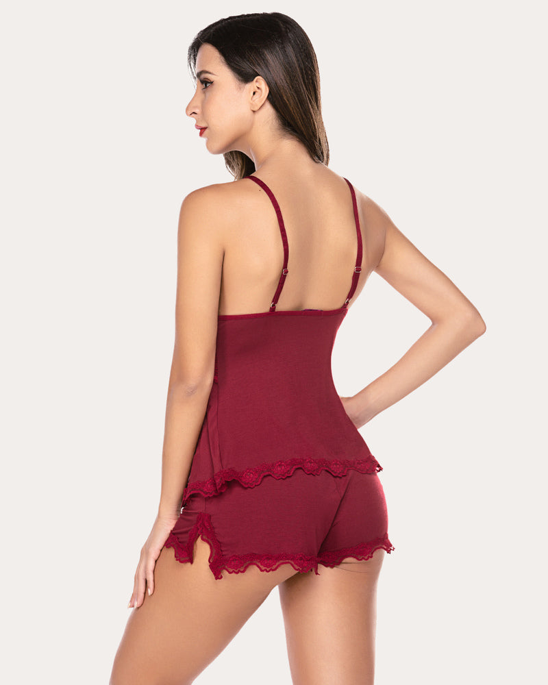 Burgundy lace nightwear pajama set with adjustable straps, floral detail, soft, breathable fabric.