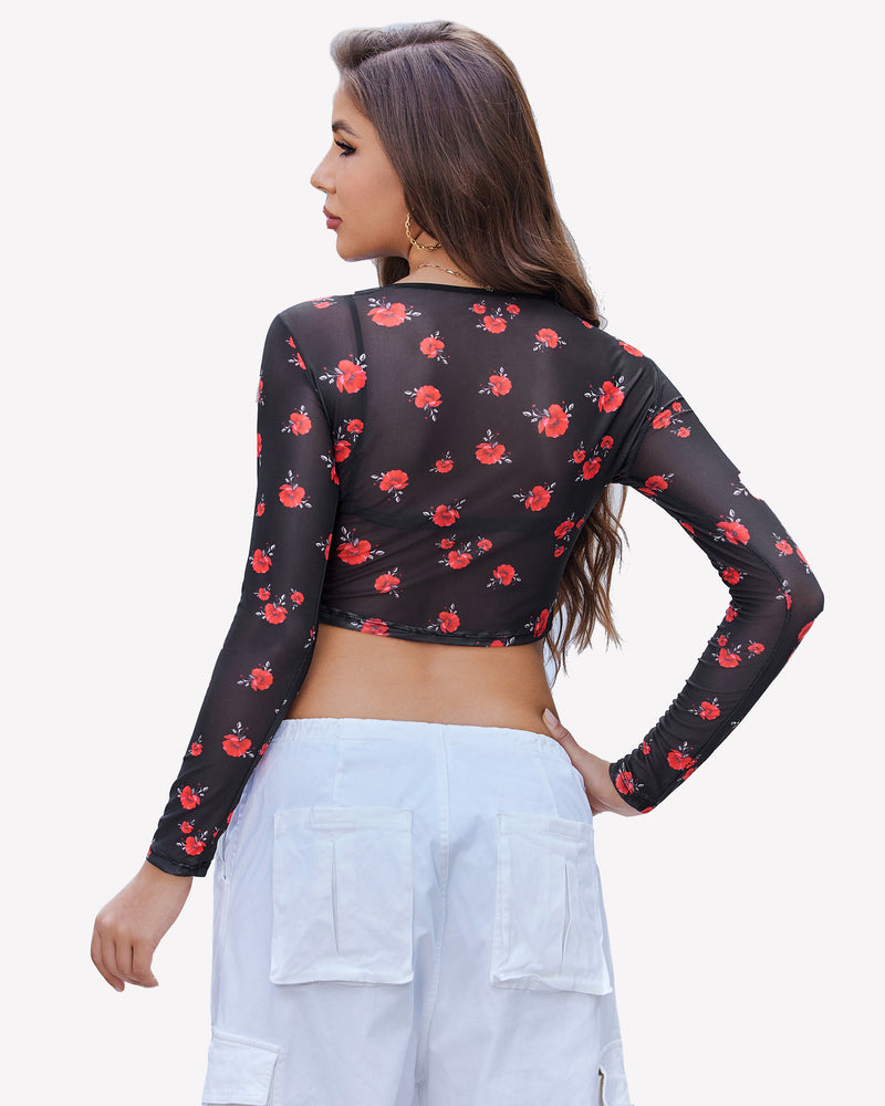 Black mesh crop top with red floral design and long sleeves, sheer style