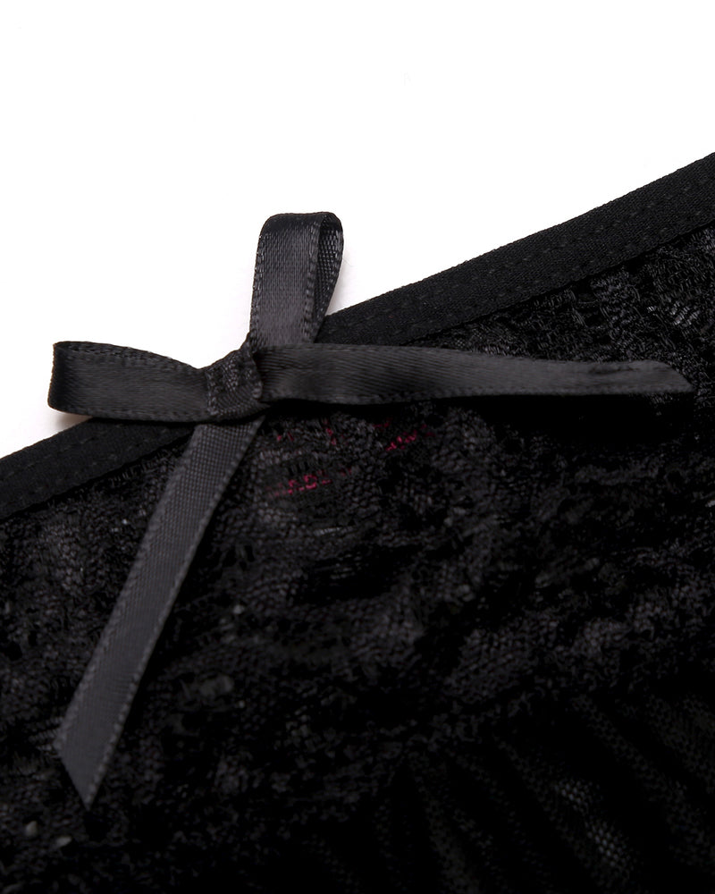 Black lace thong panty with satin bow detail. Crotchless design perfect for intimate moments