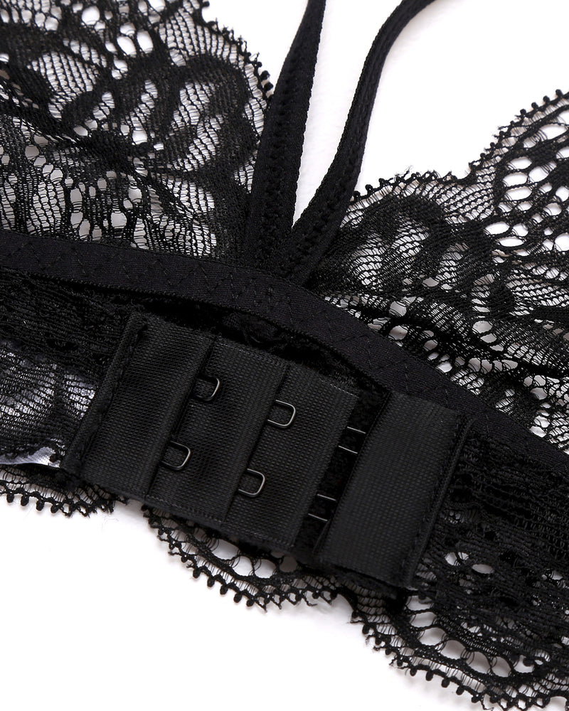 Black lace bralette with hook closure and delicate lace trim. Perfect for intimate moments.
