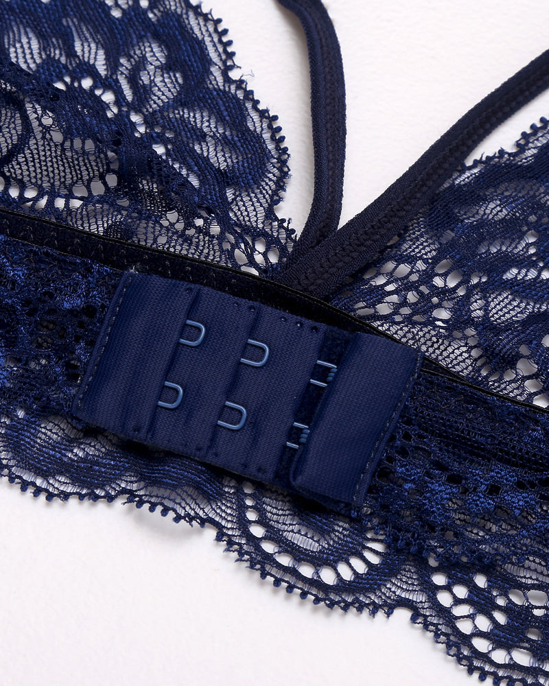 Navy lace bralette: Hook closure and delicate trim. Perfect for intimate moments. 3-piece lingerie set.