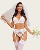 White lace bralette and garter belt lingerie set with matching panties and sheer stockings.