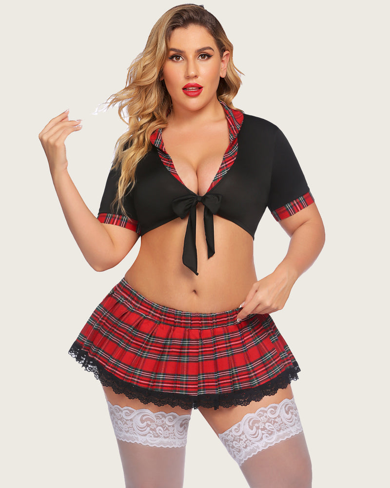 Plus size schoolgirl lingerie set: black tie top, red plaid skirt, lace trim, thigh highs.