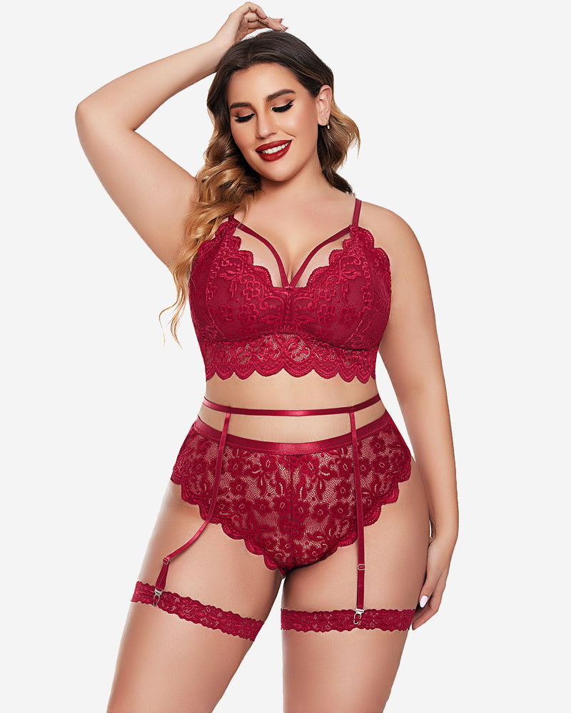 Plus size red lace lingerie set with a bralette, panties, and garter. Sexy floral design.