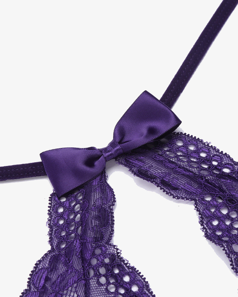 Purple lace babydoll lingerie with halter neck, satin bow, and delicate lace detail for a sexy look.