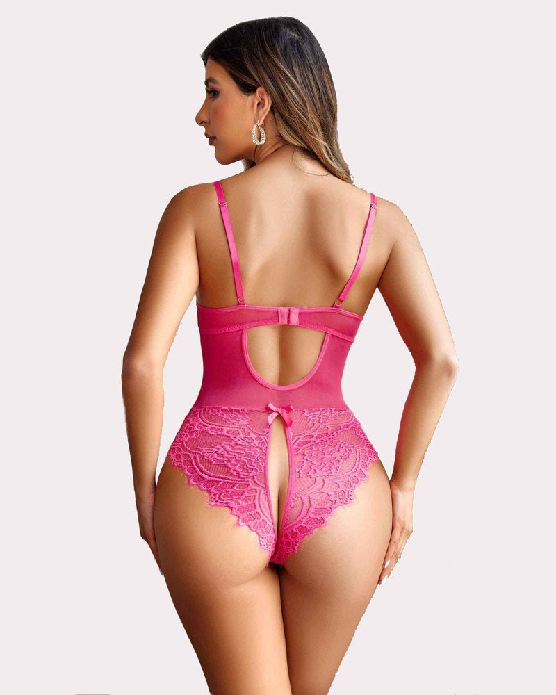 Fuchsia floral lace harness bodysuit, open crotch, criss-cross straps. Sexy lingerie by Avidlove.