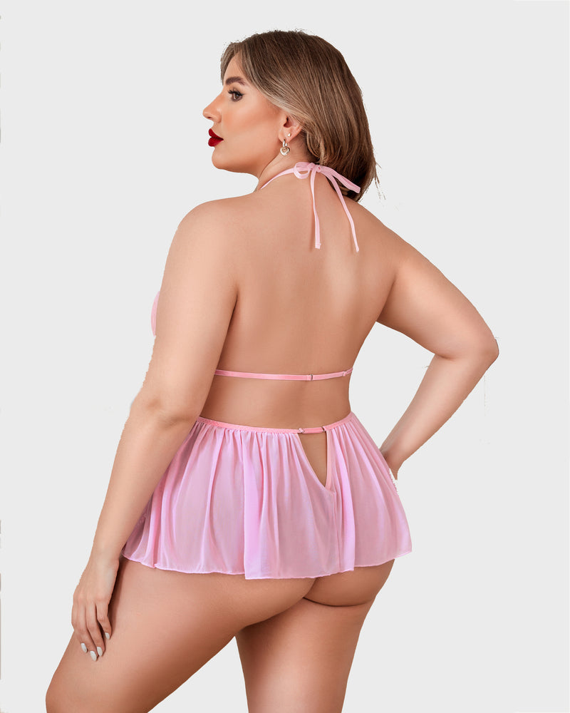 Plus size pink halter lingerie set with skirt, designed for a flattering and sensual look.