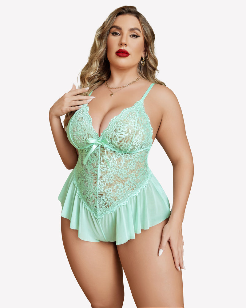 Plus size mint green lace bodysuit with adjustable straps, featuring floral lace and ruffle skirt.