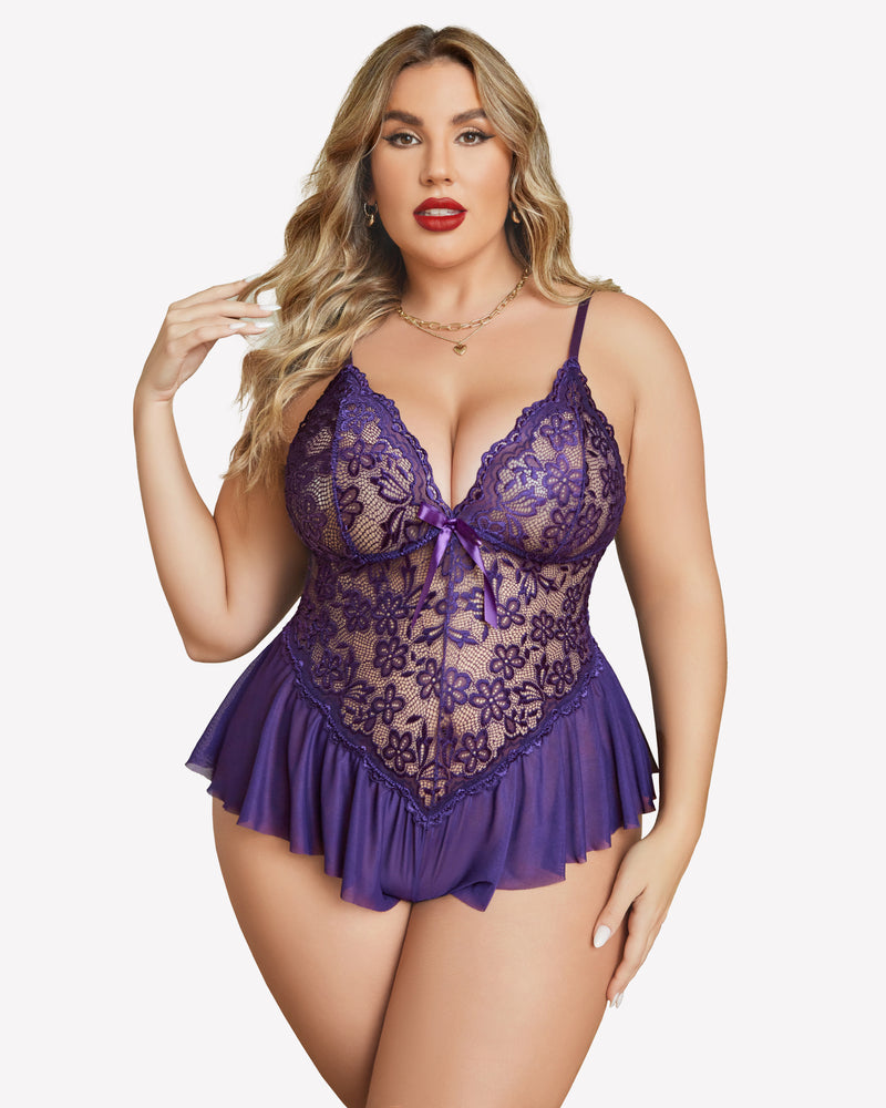 Plus size purple lace bodysuit with adjustable straps and ruffle skirt on model, sexy lingerie