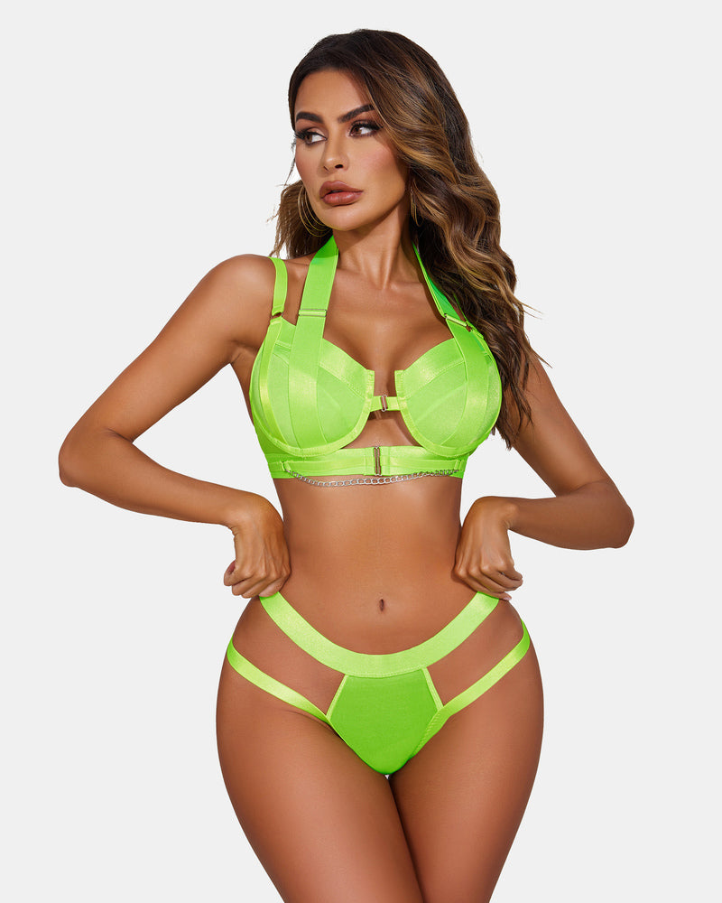 Neon green lingerie garter set with chain detail; sexy, modern design.
