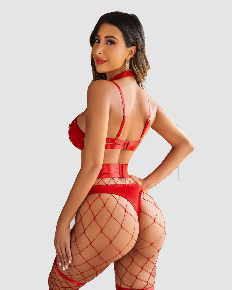 Red bondage lingerie set: cut-out bra, garter belt, choker, fishnet stockings. Shows curves.