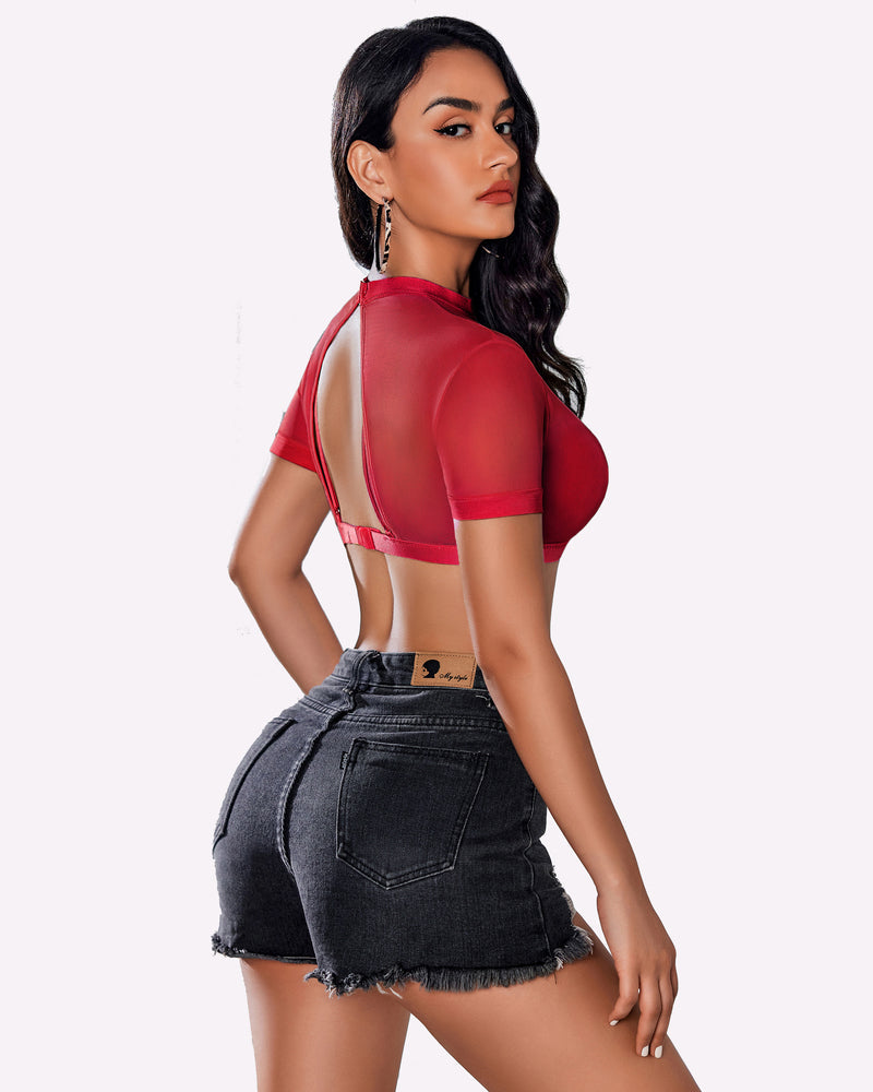 Red see-through crop top with bra, paired with denim shorts. Sexy and fashionable look.