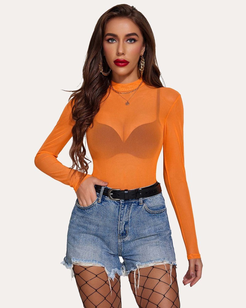 Orange mesh mock neck crop top, paired with denim shorts. Sexy and confident fashion statement.