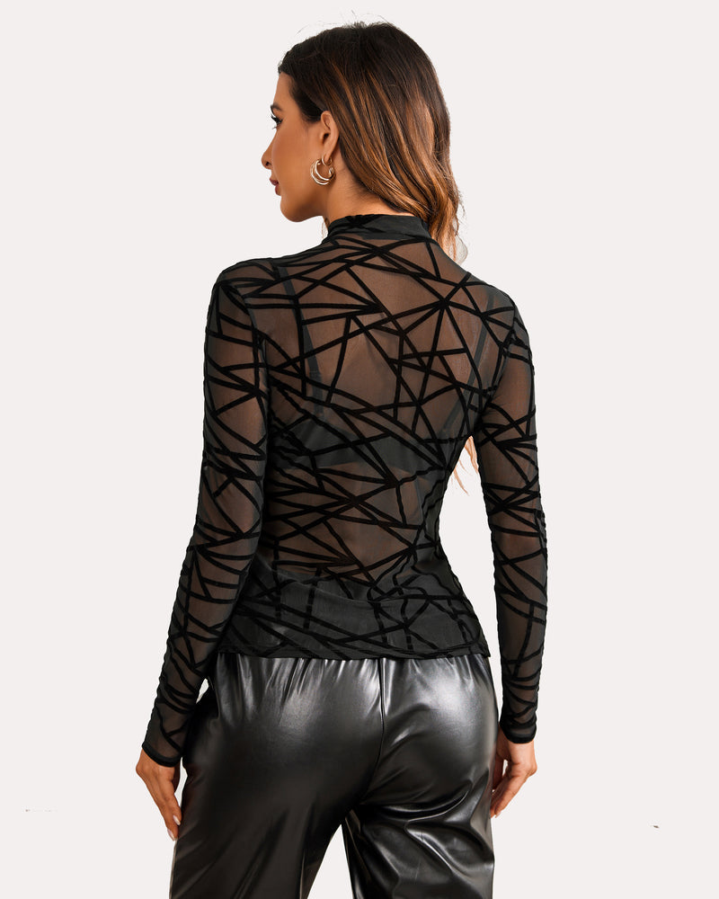 Black mesh mock neck crop top with geometric design and leather pants. Confident and sexy look.