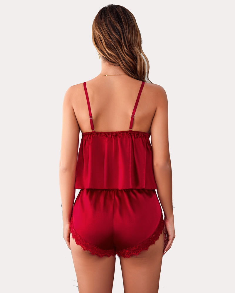 Red satin cami and shorts set. Sexy women's silk pajamas with lace trim for sleep or lounge.