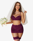 Burgundy lace bridal lingerie set with mini skirt and veil. Floral lace design.