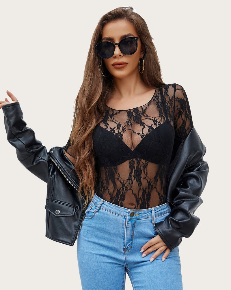 Black floral lace mesh top with short sleeves, paired with jeans. Sexy and confident style.