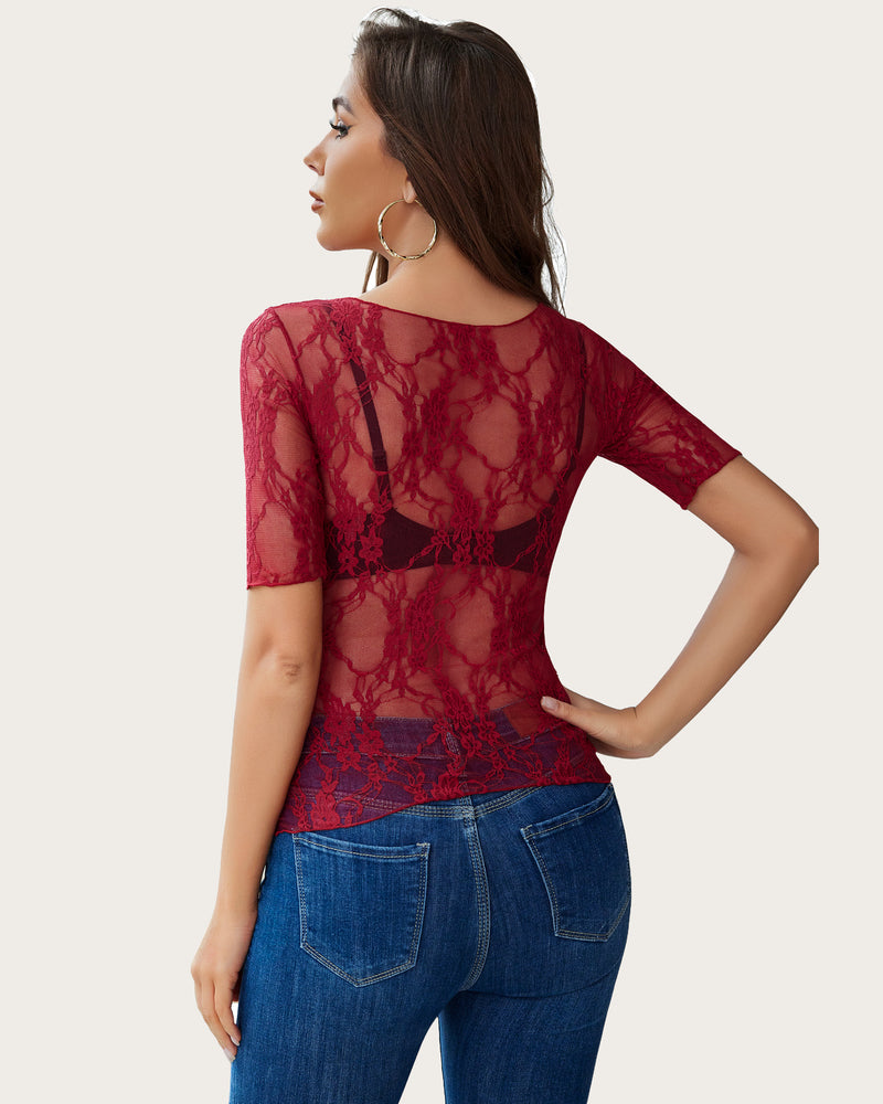 Burgundy floral lace mesh top with blue jeans. Sexy and confident style for women.