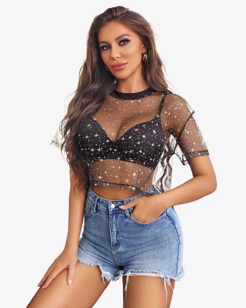 Black star mesh crop top paired with denim shorts, a trendy see-through outfit for women.