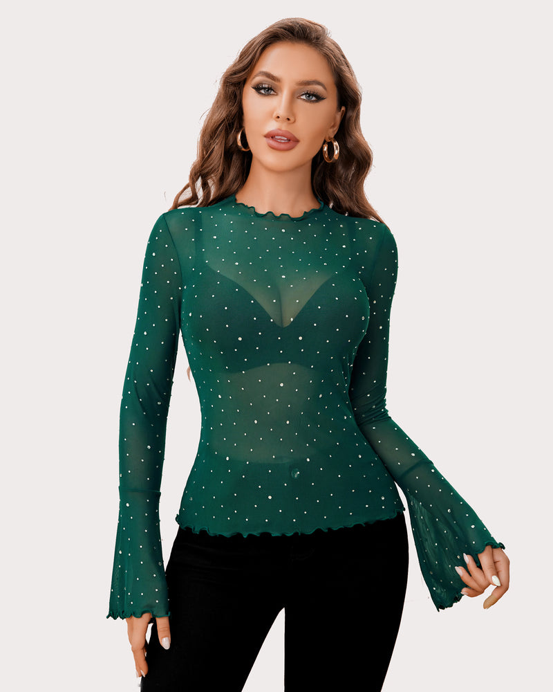 Emerald green mesh rhinestone top with mock neck and bell sleeves, creating a sexy look.