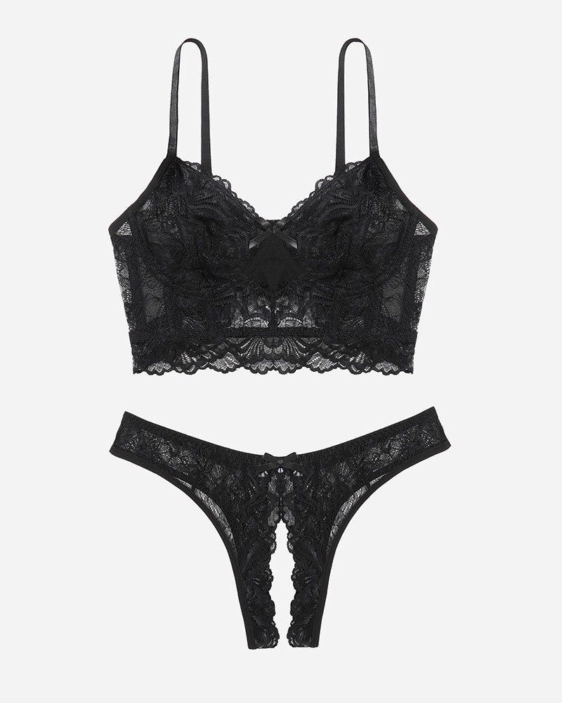 Black lace bra and crotchless panty set with bow details, offering a flattering and sexy look