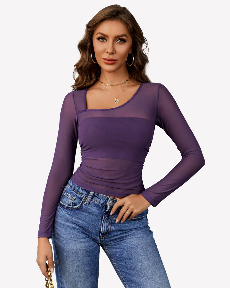 Avidlove purple mesh asymmetrical crop top, showcasing neckline details, with blue jeans.