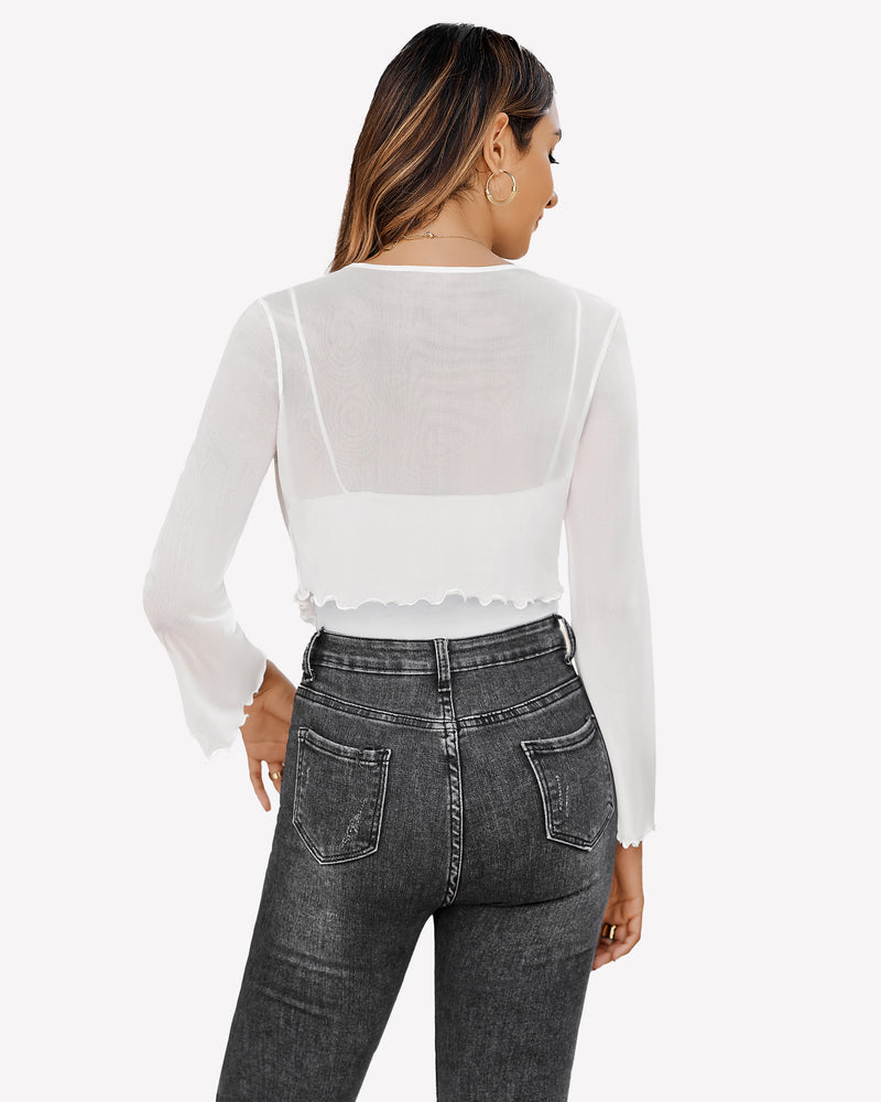 White sheer mesh shrug with bell sleeves, paired with jeans, a versatile top.
