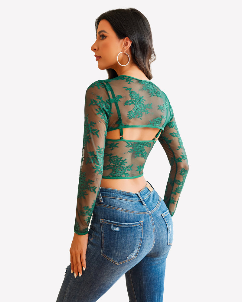 Green lace long sleeve crop top with matching bra and blue jeans. Sexy lingerie for women.