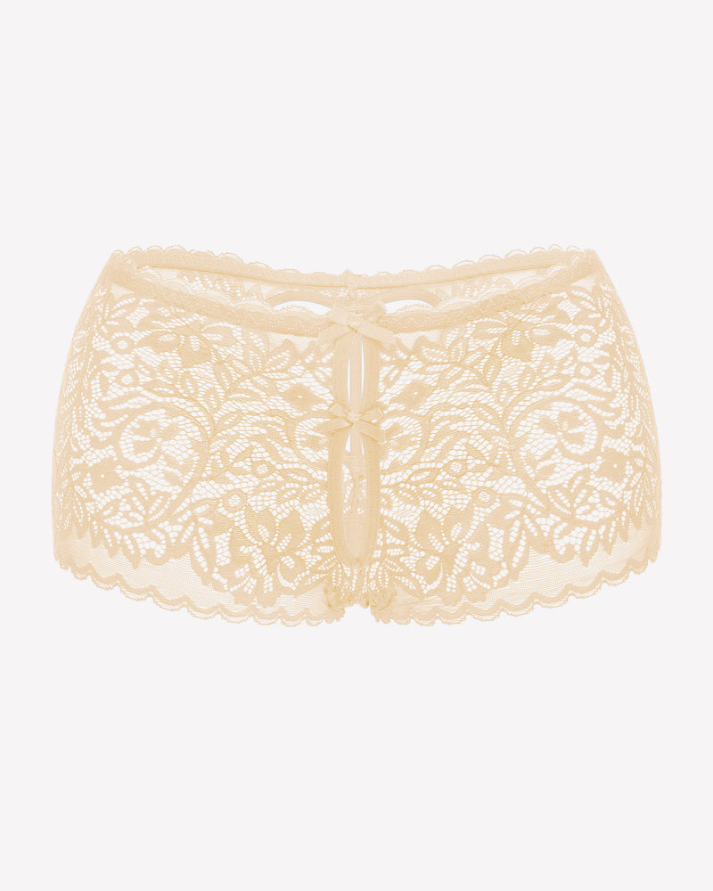 Beige lace boy shorts with bow accent. Mid-waist, soft lace panties for a no-line look.