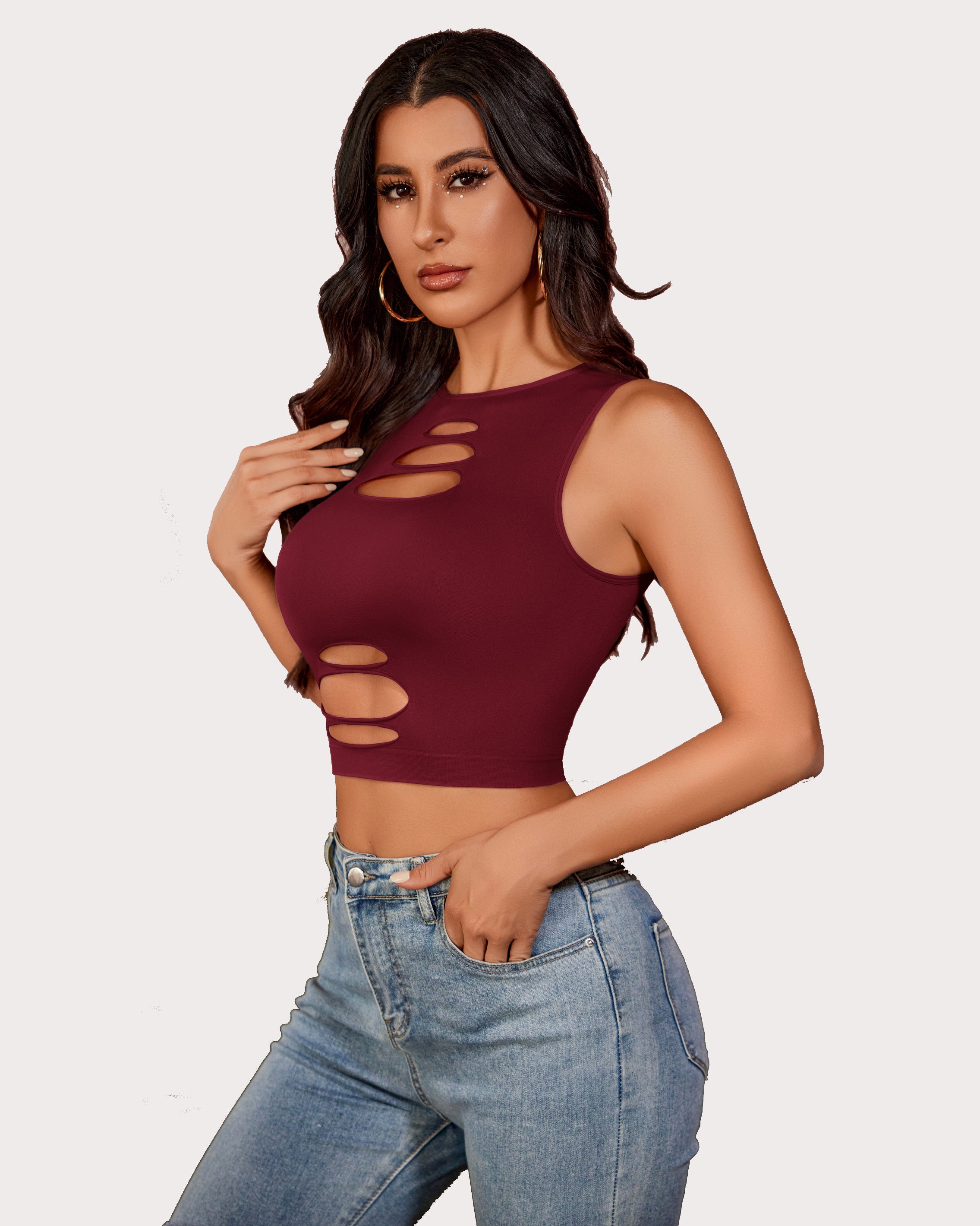 Burgundy cut-out crop top with denim jeans, fashionable and sexy for women. Fishnet crop top.