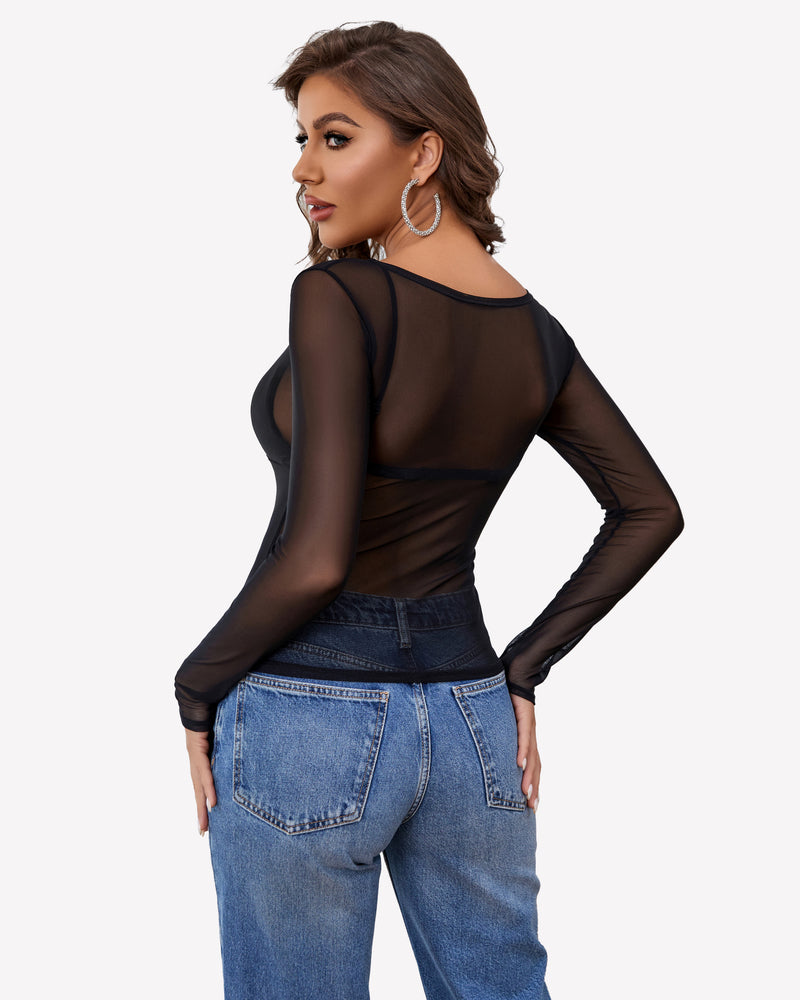 Black mesh long sleeve blouse, off-shoulder option, paired with blue jeans; sexy and stylish.