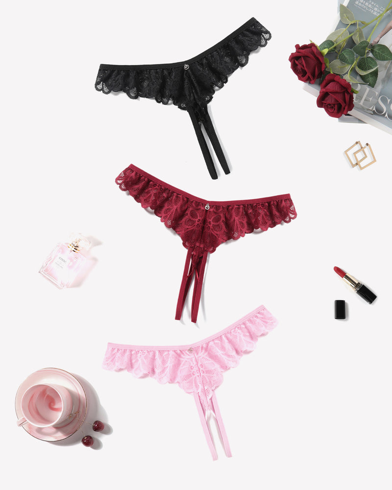 Criss-cross lace thong briefs in black, burgundy, and pink