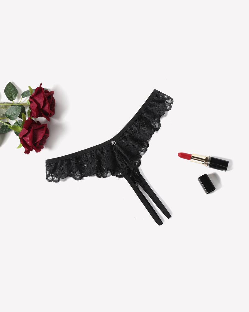 Black lace thong briefs with criss-cross design and ruffle trim, perfect for special occasions