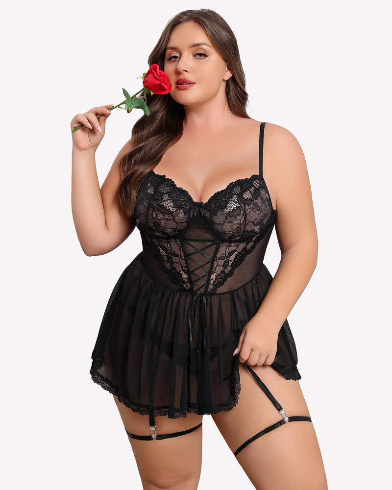 Plus size black lace babydoll with garter belt, sheer lace cups and mesh skirt, model with a rose.