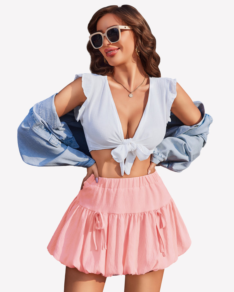 Pink bubble hem mini skirt with tie details, white crop top, Y2K style, perfect for parties