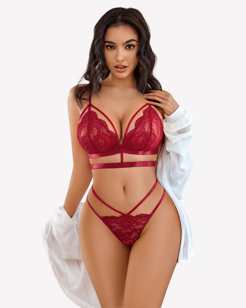 Burgundy lace bra and panty set with strappy details, perfect for lingerie or underwear.