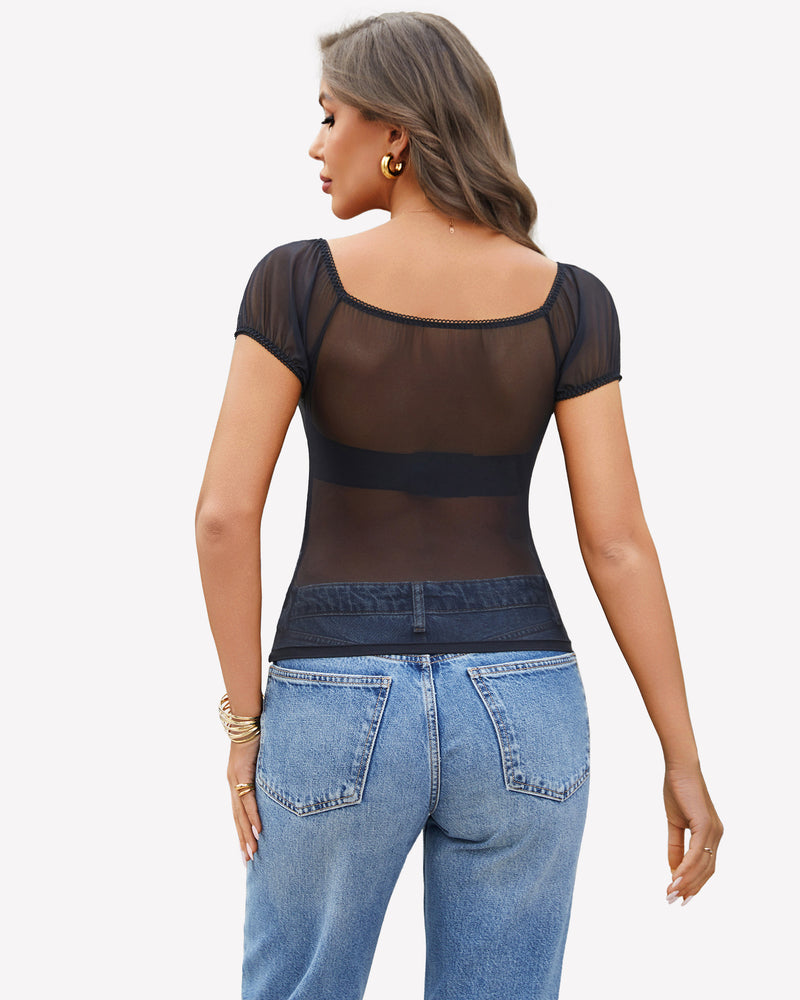 Sheer black mesh top with square neckline and short sleeves, paired with blue jeans
