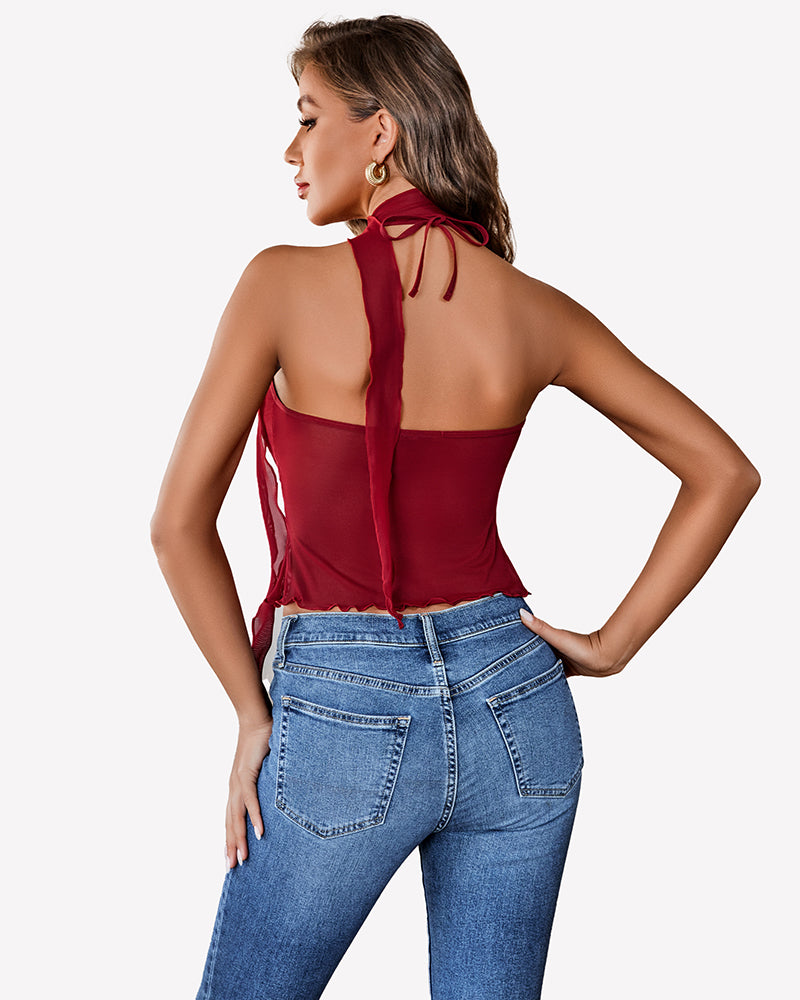 Burgundy mesh Y2K crop top, halter neck, blue jeans, casual wear, Y2K fashion.