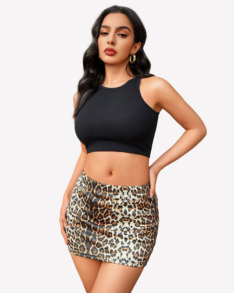 Y2K leopard print mini skirt with black crop top, pencil bodycon style, confident look