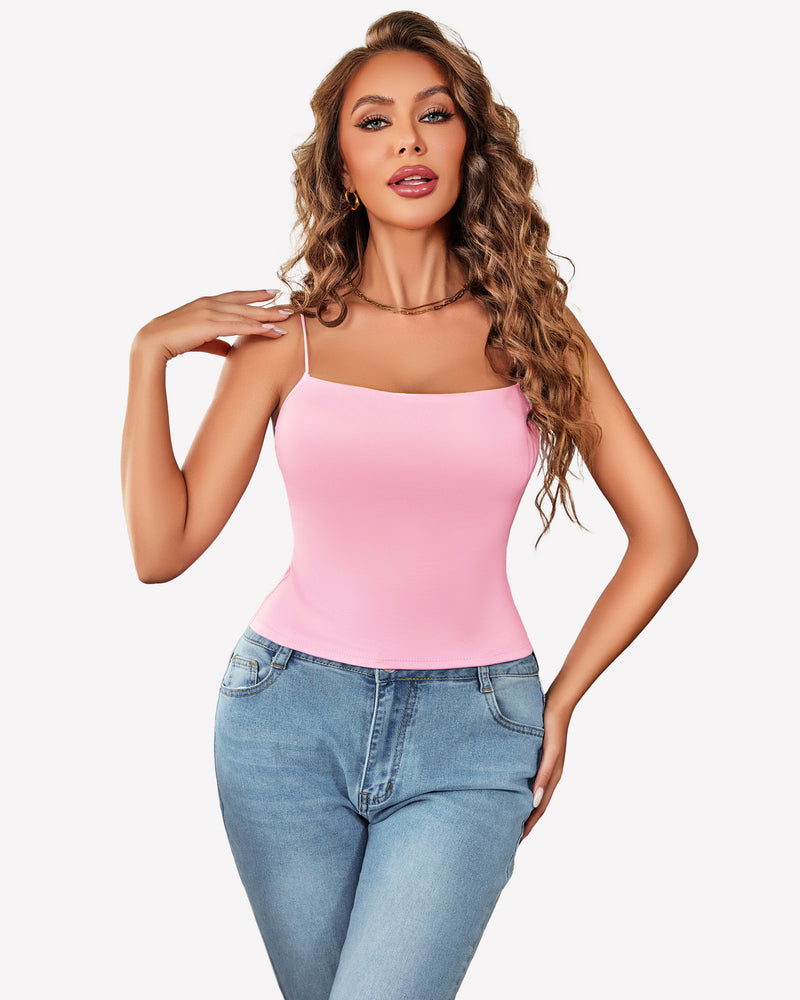 Pink double-lined cropped top with thin straps and light blue jeans, perfect for summer