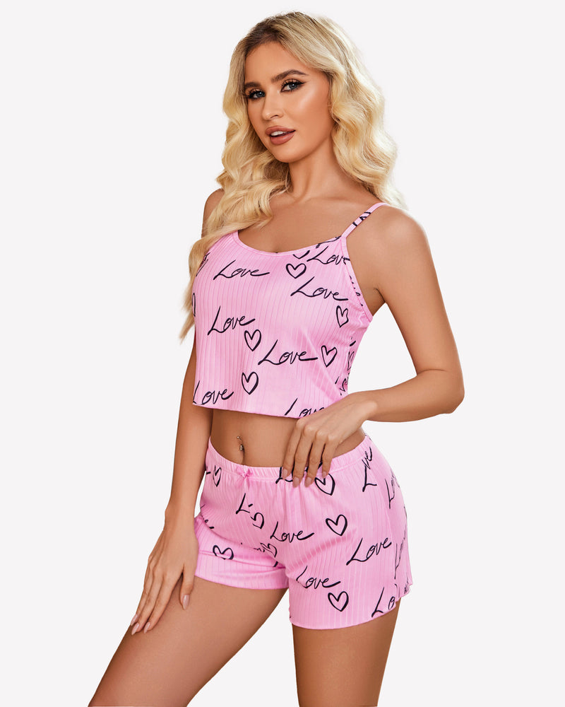 Pink ribbed lounge set with 'Love' and heart print, comfortable sleepwear for women.