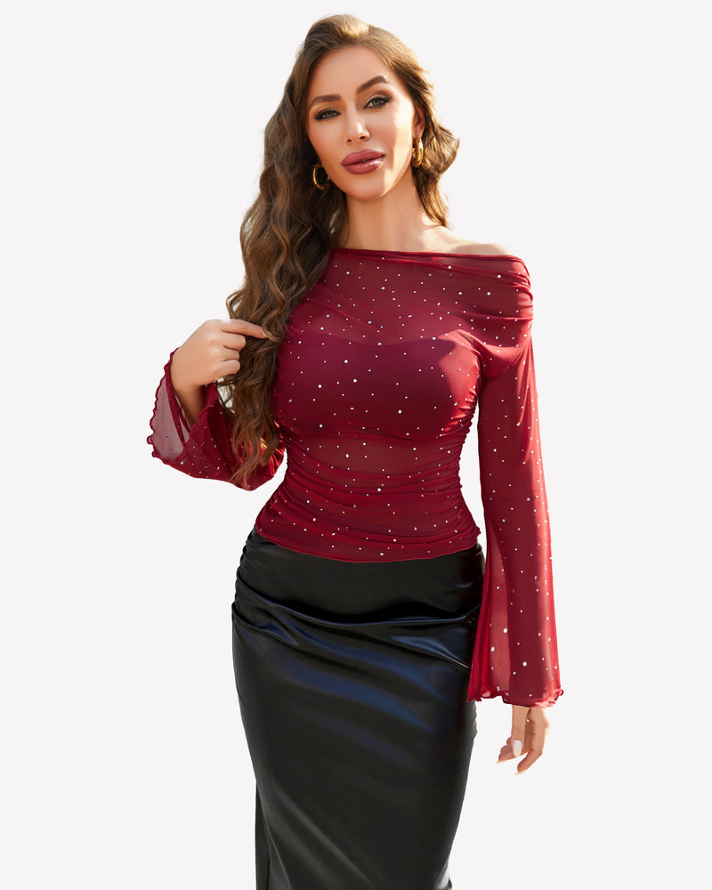 Burgundy mesh off-shoulder shirt with rhinestone accents, bell sleeves, and a black skirt.