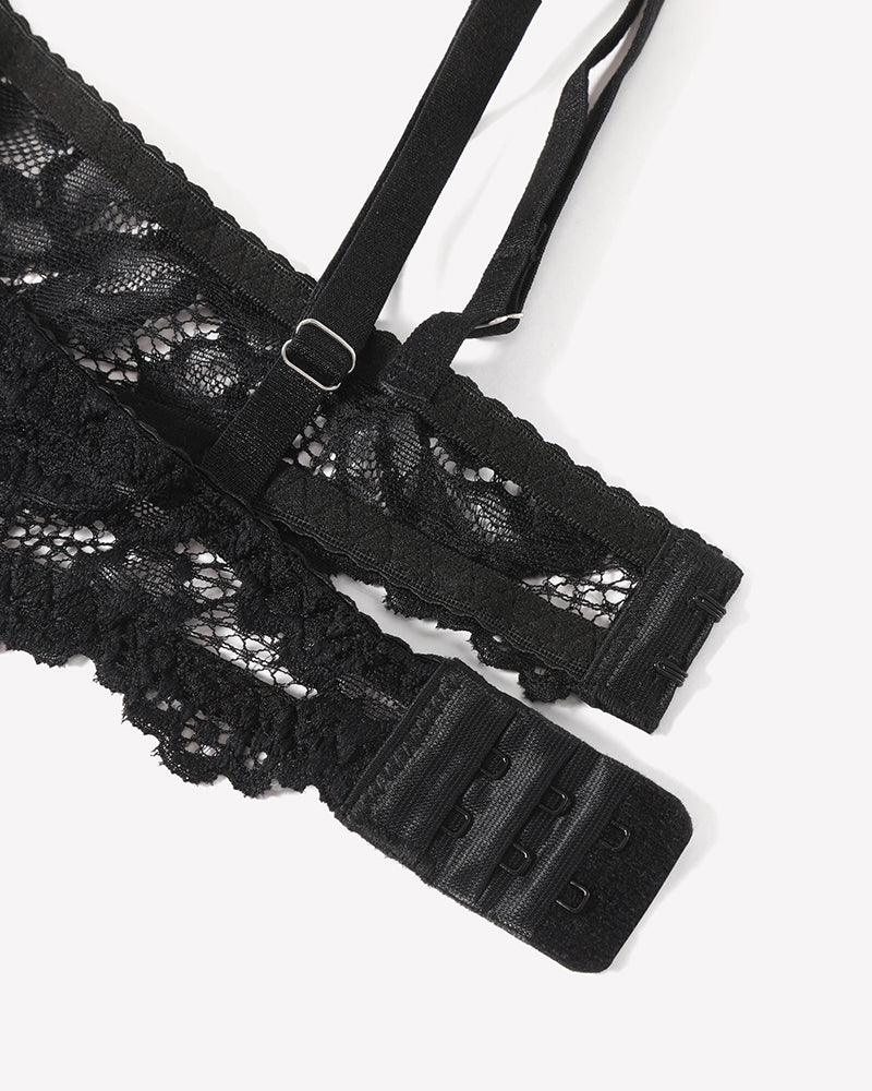 Black lace bra detail with adjustable straps and hook closure, part of a sexy lingerie set