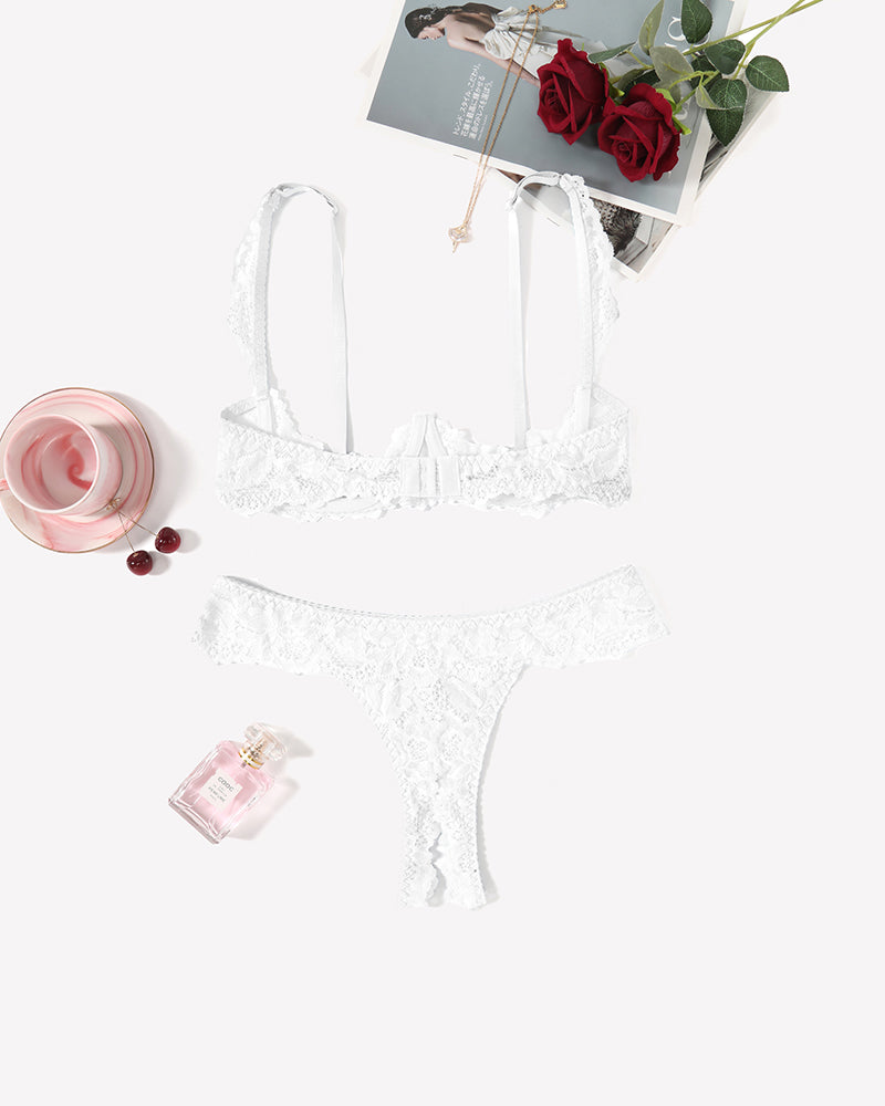 White lace lingerie set with underwire bra and thong panty. Sexy and romantic lingerie for women.