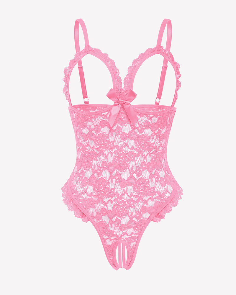 Pink lace teddy bodysuit with ruffle V-neck, adjustable straps, and bow. Romantic lingerie.