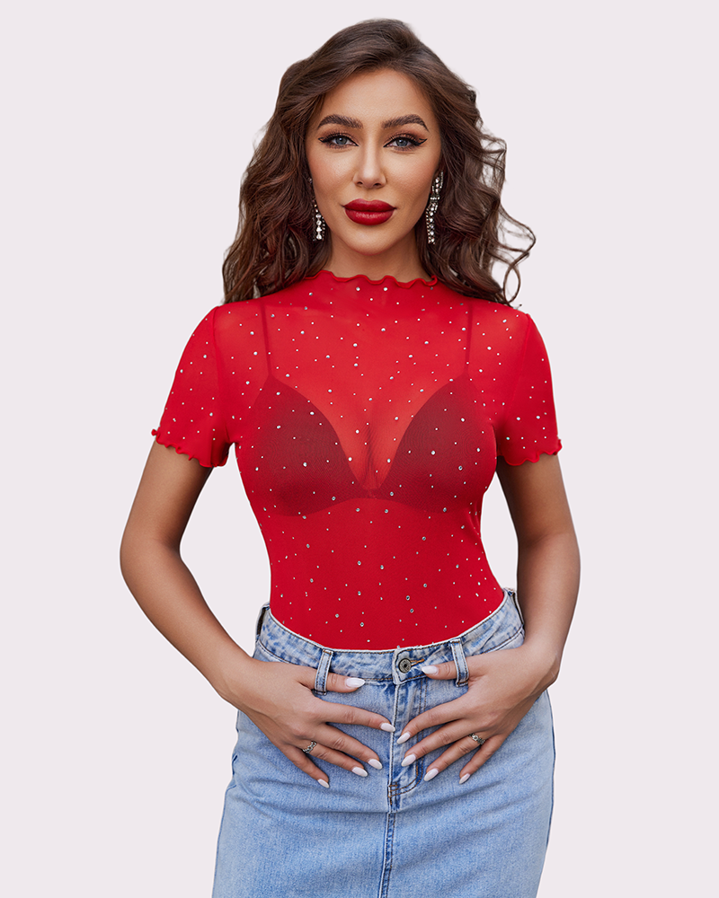 Red mesh rhinestone short sleeve top with ruffle hem, paired with denim jeans. Sexy lingerie.