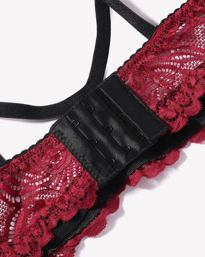 Red floral lace bra with black straps and hook-and-eye closure. Sexy lingerie for women.