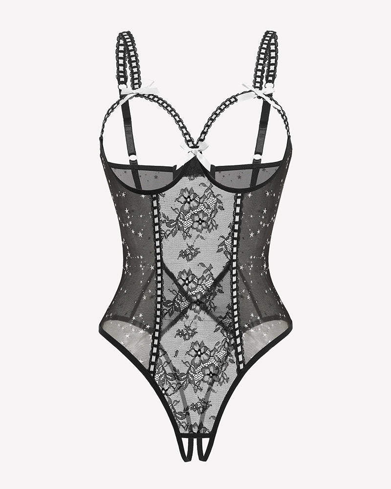 Crotchless lace mini teddy bodysuit in black with star pattern mesh and lace-up straps